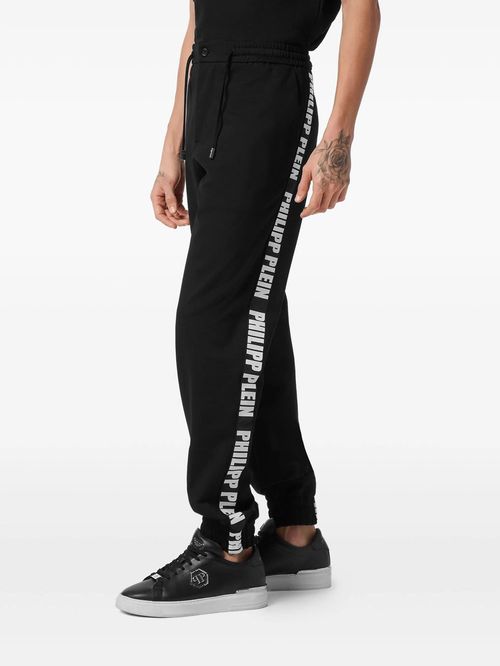 Pantaloni cu bandă logo