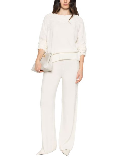Pantaloni crem din tricot